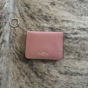 Pink valentine coach wallet card holder with clear id back.